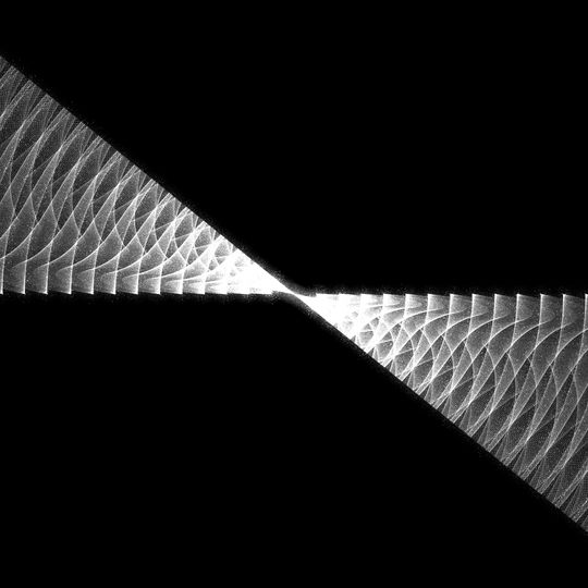 A black void splits open as two diagonal lines intersect. The new space reveals many sparkling, concentric waves of light.